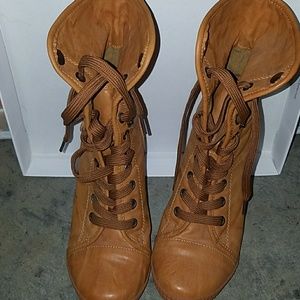 orangey colored vegan leather wedged boots